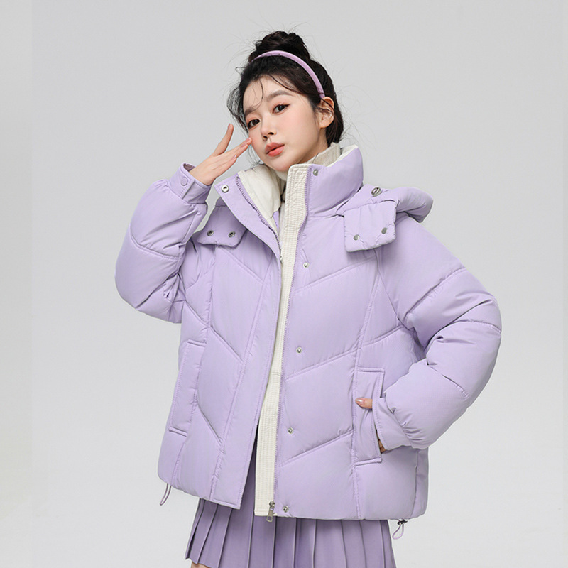 Algodón mujer 2025 otoño y invierno nuevo estilo coreano corto engrosado plumón chaqueta de algodón pequeño suelto chaqueta con capuzas de color contraste