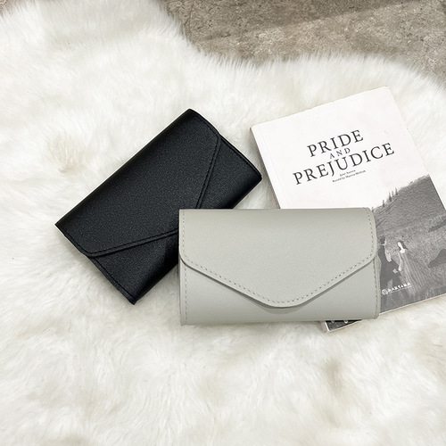 新款纯护照夹钱包女士长款拉链手拿包毛球简约零钱包一件发