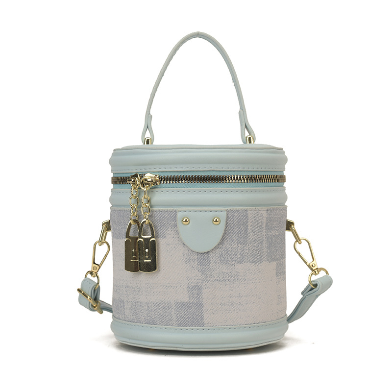 Bolsa de cilindro coreana de diseño popular de nicho 2026 nueva moda simple de hombro portátil bolso de cubo