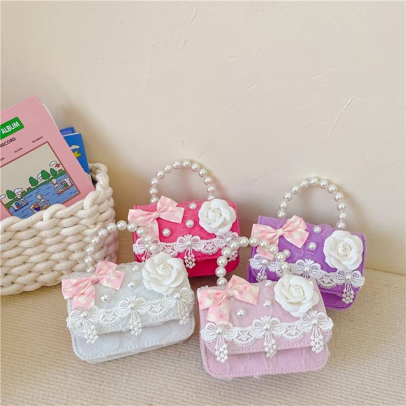 Bolsa para niños bolsa de mensajero de aire exterior 2022 nueva niña moda linda princesa bolsa de hombro pequeña fragancia bolso