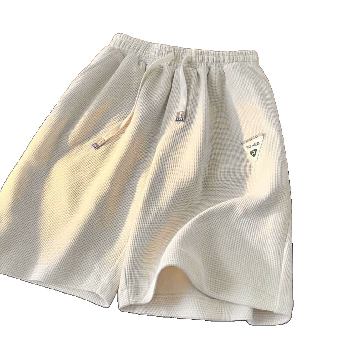 Diseño delgado nicho relajado de verano nuevo estilo americano pantalones cortos de moda hombre pantalones deportivos casuales de cinco puntos
