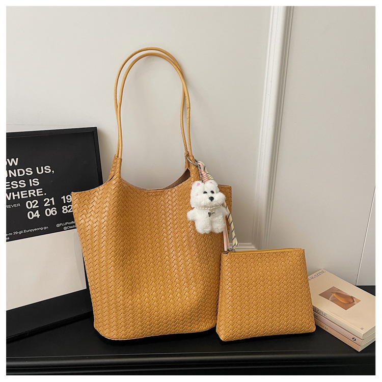 Bolsa coreana de gran capacidad para mujeres 2026 verano nuevo estilo de moda trenzado bolso de hombro axilar de viaje bolsa de ocio
