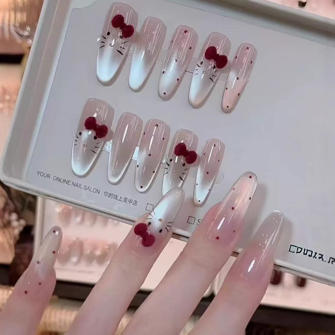 10-piece set of pre-made nail art for sweet girls, featuring vibrant velvet polka dots and KT cat designs, detachable and wearable nail patches for students 10-piece set of pre-made nail art for sweet girls, featuring vibrant velvet polka dots and KT cat designs, detachable and wearable nail patches for students