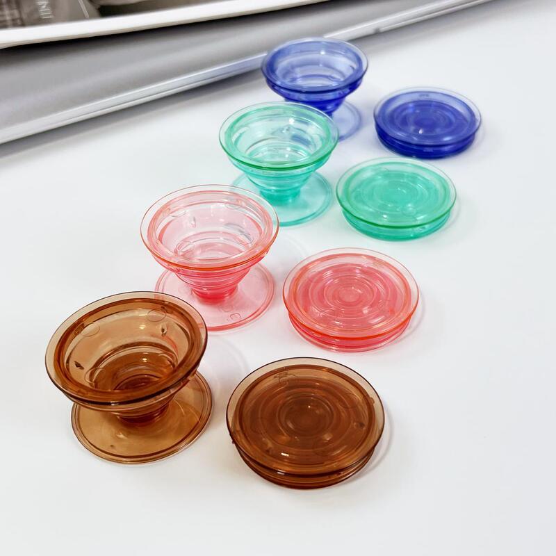 Transparent airbag bracket retractable folding printable LOGO mobile phone lazy fluorescent color multi-color spot second hair