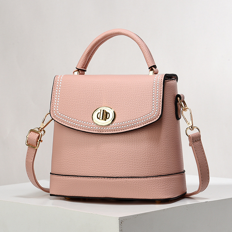 Bolso de mujer nuevo nicho de diseño texturizado bolso de hombro de moda moda bolso de mano práctica mochila bolsas