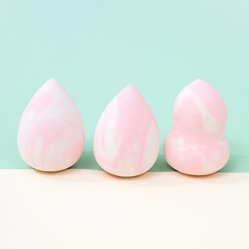 Maquillaje de belleza transfronterizo personalizado de fábrica, soplo de polvo de color mixto, no coma polvo, se agrandará cuando se encuentre con el agua, cojín de aire de esponja de maquillaje seco y húmedo