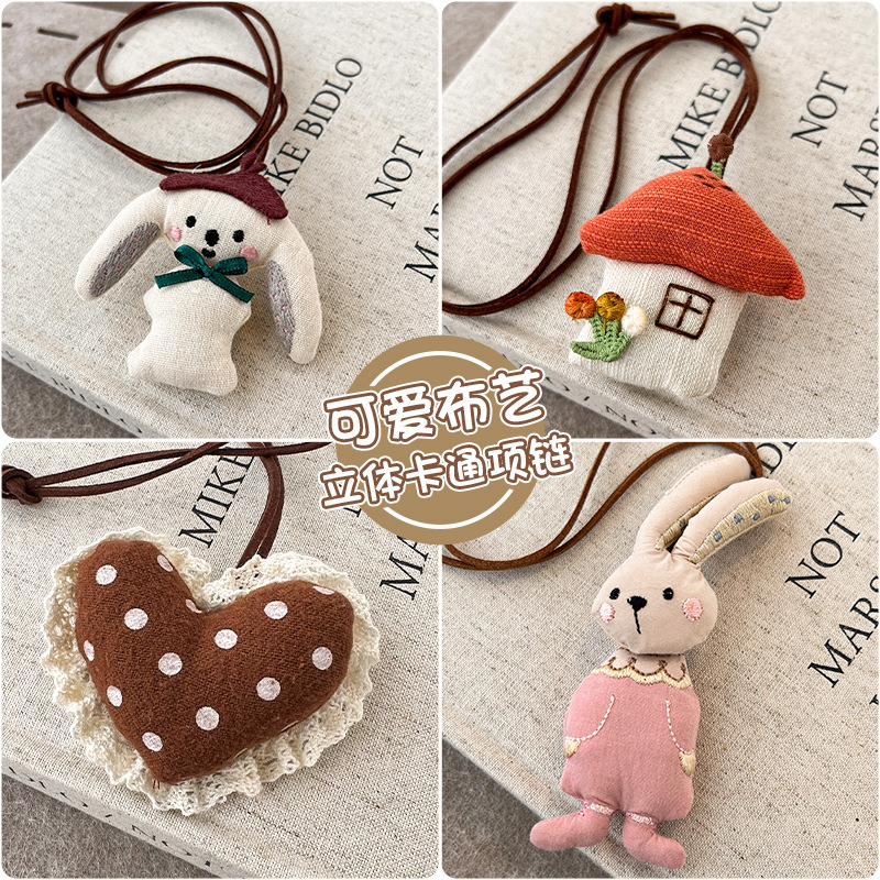 Niños lindos colgante de tela coreana muñeca estereoscópica pequeña caricatura conejo accesorios de niña pequeña manzana colgante