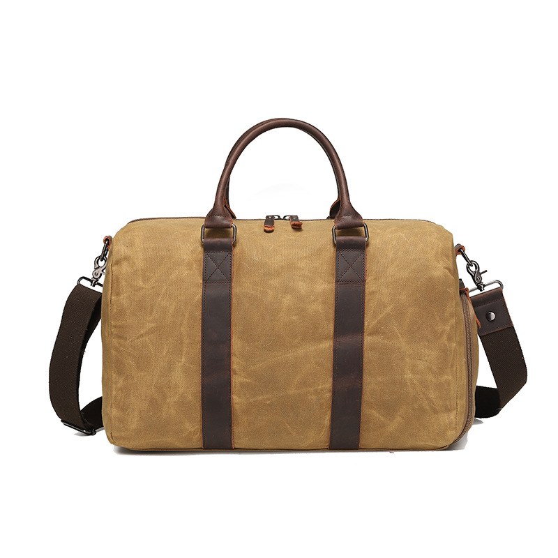 Nueva bolsa de viaje de tela de cera de aceite resistente al desgaste retro europea y americana color sólido bolsa de hombro al aire libre bolsa de almacenamiento al por mayor