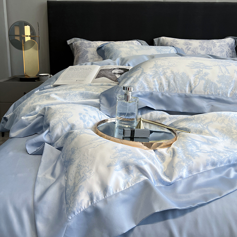 Cama de seda de hielo de verano de cuatro piezas de lujo ligero de alta gama 2025 nueva funda de edredón de sábana de tres piezas ropa de cama de seda lavada