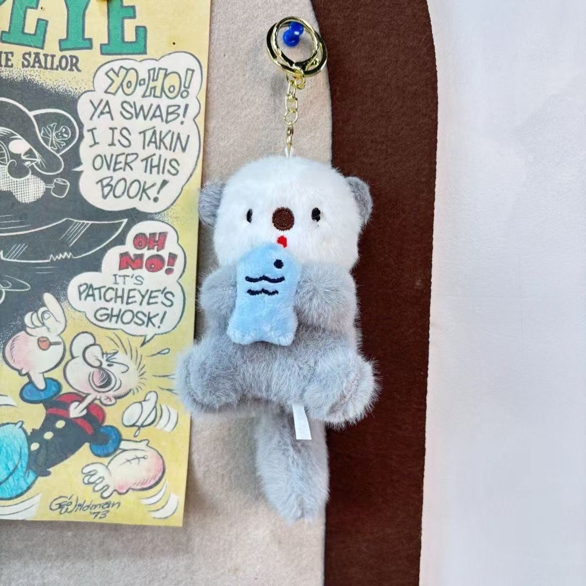 Red popularidad adorable Haise colgante juguetes de peluche muñeca pescado nutria bolsa colgante llavero muñeca muñeca