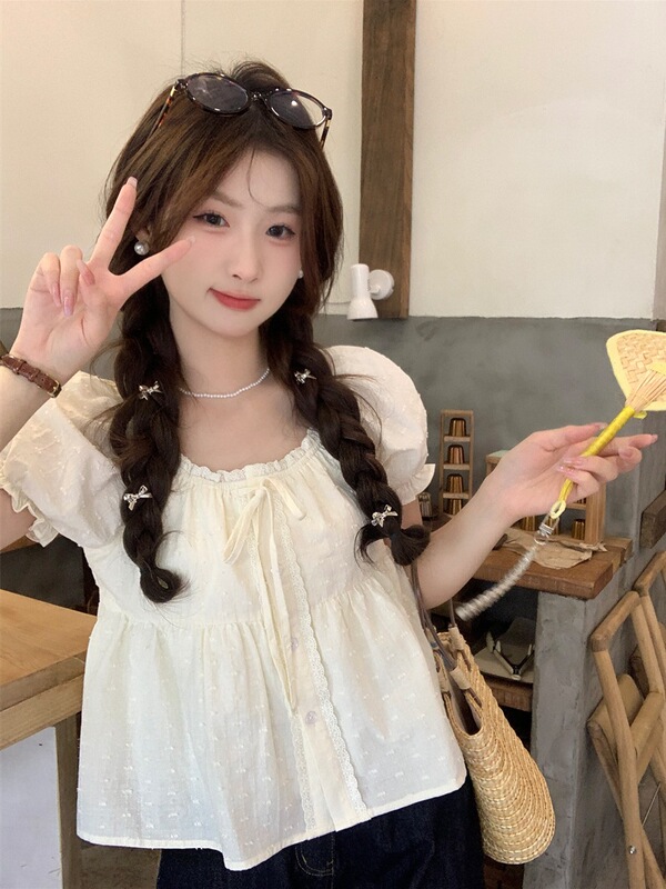 Real Shot of a Sexy Petite Woman Wearing a White Lace-Trimmed Puff-Sleeve Shirt, Slim-Fit Short-Sleeve Chic Blouse Real Shot of a Sexy Petite Woman Wearing a White Lace-Trimmed Puff-Sleeve Shirt, Slim-Fit Short-Sleeve Chic Blouse