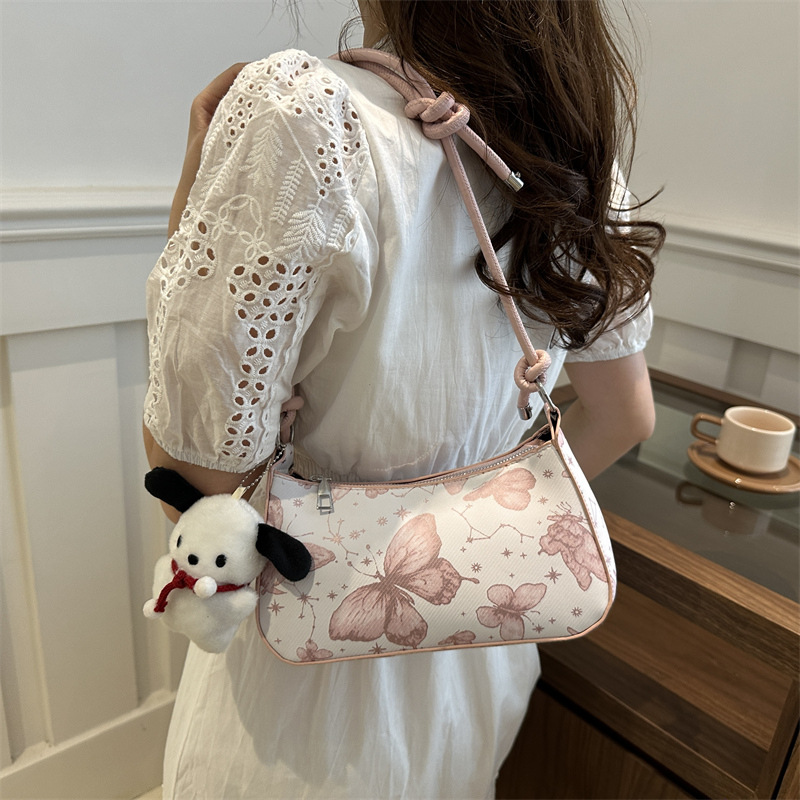 Bolso de diseño de nicho para mujeres 2024 nuevo estilo coreano lindo bolso de brazo portátil para mujeres sensación de alta calidad de una sola mochila de hombro de moda