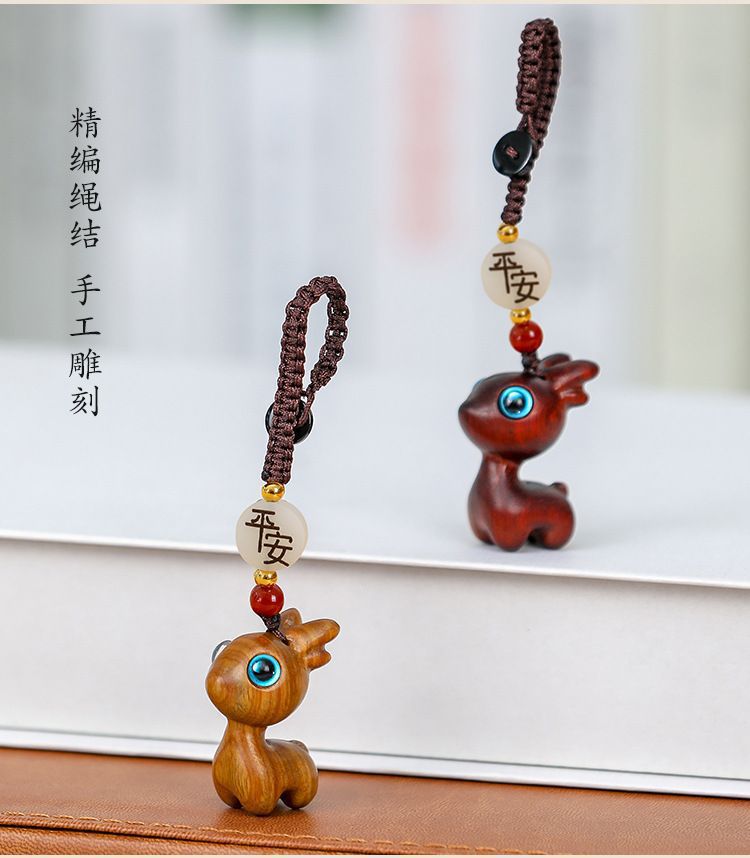 A deer car key chain pendant sandalwood deer buckle key car decoration deer couple pendant