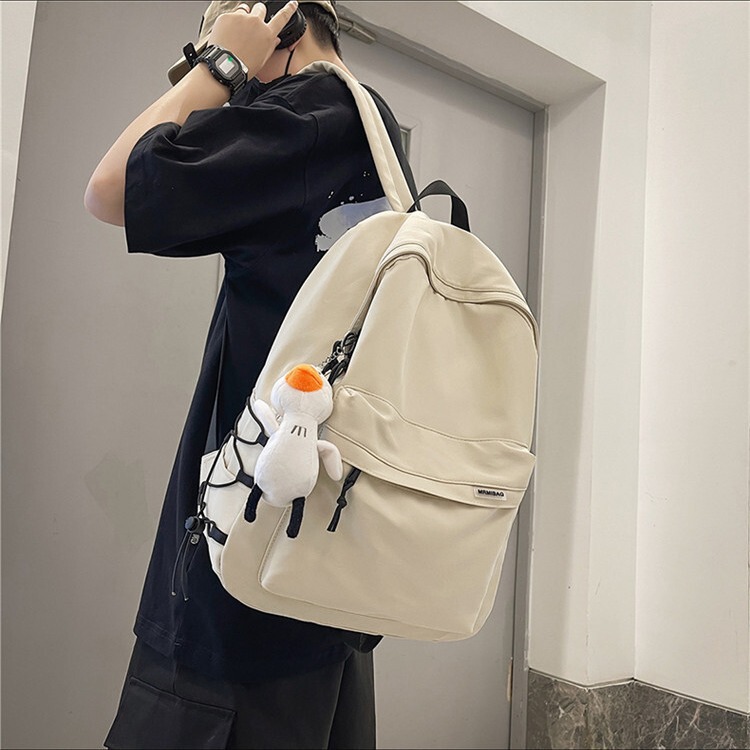 Backpack men's simple large capacity travel backpack women's casual Japanese junior high school student schoolbag men
