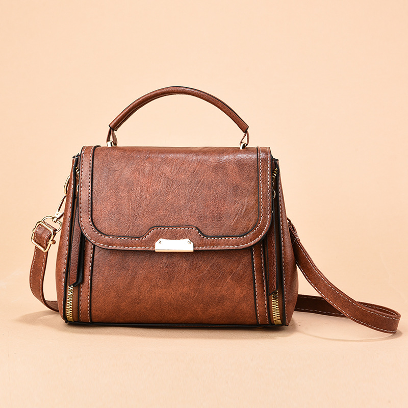 Bolsa de mano para mujeres Taizhou bolsas de mujer retro bolsas de hombro de hombro universal de moda alta sensación de bolsas de madre