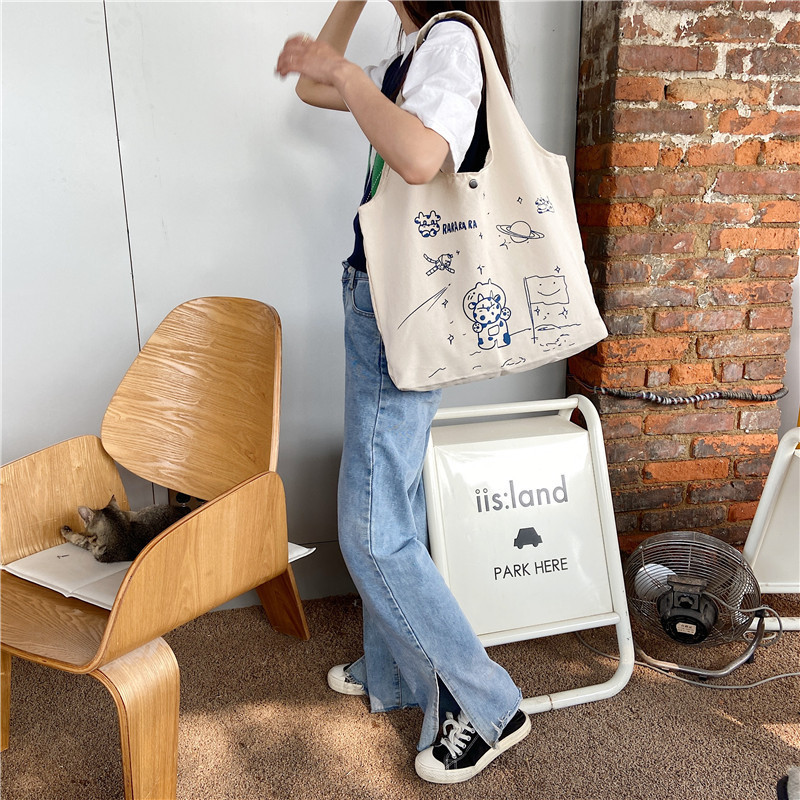 【 In Stock 】13173 Cute Moon Landing Cow single-shoulder Bag, student girls' schoolbag, canvas bag, large capacity wholesale undefined