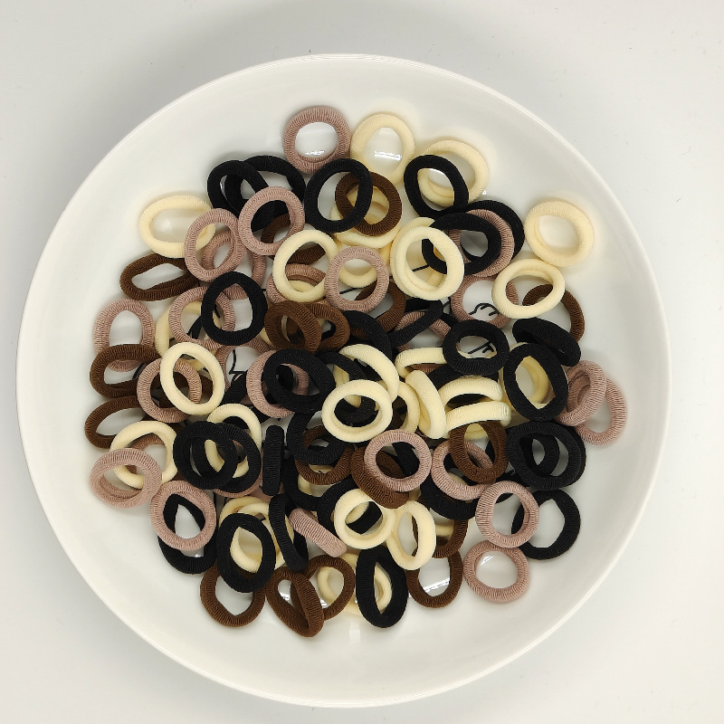 Color de caramelo de alta elasticidad pequeña toalla anillo de cabello bebé anillo de cabello no daña cabello atado fábrica de cabello al por mayor