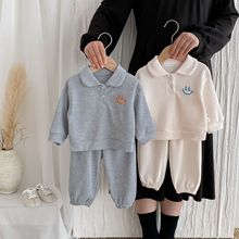 ins童装韩国秋季2025新品男女宝宝套装华夫格长袖上衣+长裤两件套