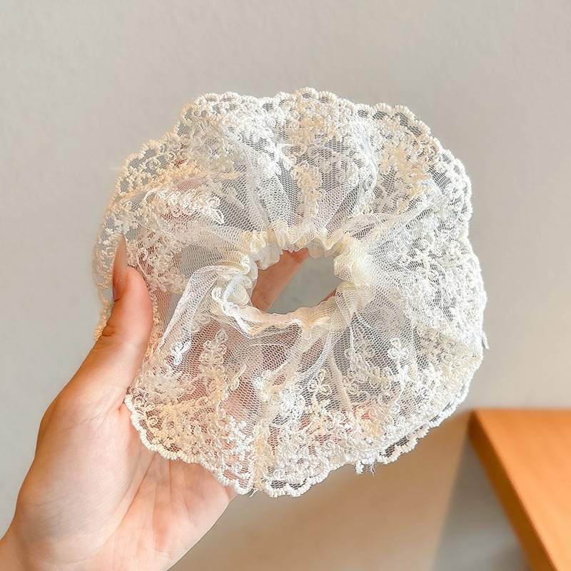 Pastoral viento intestino anillo de cabello mujer 2025 nuevo estilo de alta sensación bola de cabello cuerda de cabeza flor dulce princesa adornos de cabello cuerda