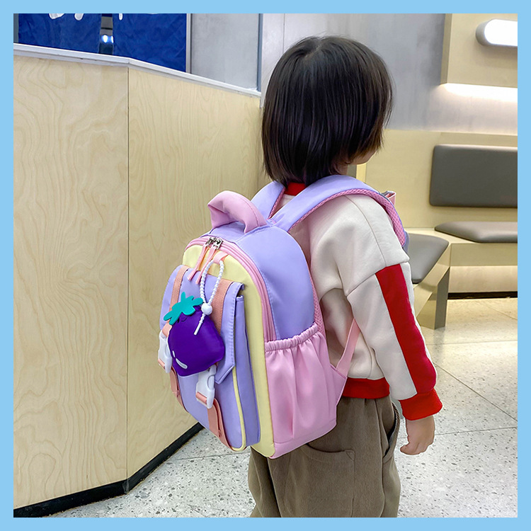 Nueva mochila escolar de jardín de infantes, reducción de la carga ligera, color de contraste, mochila de tendencia, mochila escolar pequeña para niños, mochila de viaje
