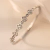 Steel bracelet, four-leaf clover