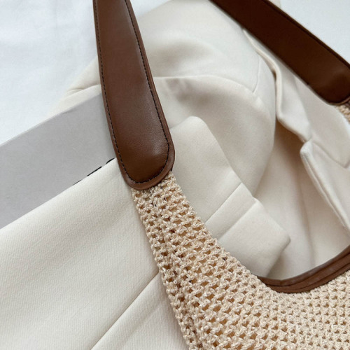 Niche hollow design bag for women 2024 new fashion straw shoulder bag versatile armpit woven tote bag