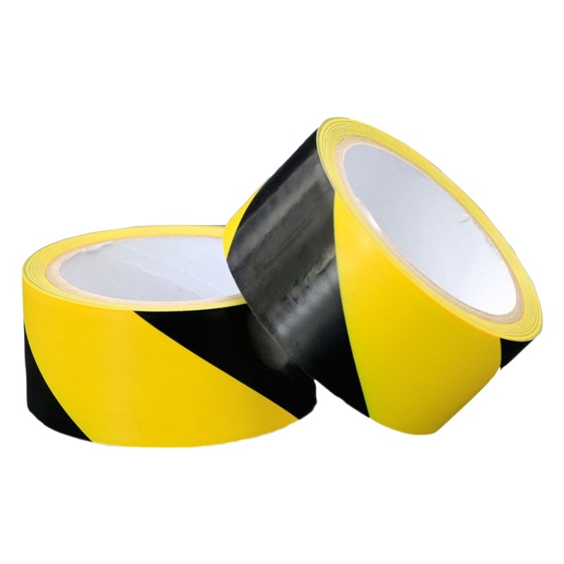 Los fabricantes suministran cinta de advertencia negra y amarilla al por mayor, cinta de marcado de suelo tipo cebra, cinta de advertencia de PVC al por mayor.