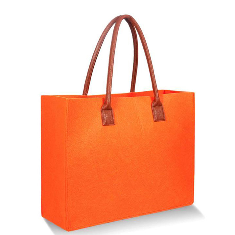 厂家定制 毛毡手提包 皮革手提 简约时尚毛毡手提挎包 可定制