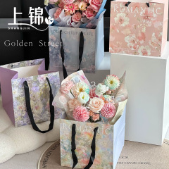 七夕のバレンタインデーの新型のシチリアの油絵風の手提げ袋は手を持って花の花束の袋の贈り物の包装袋を持ちます。