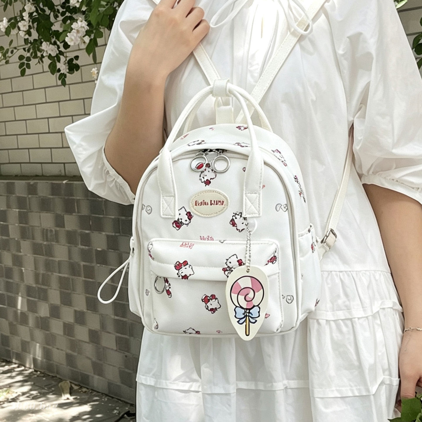 2026 impresión de moda mochila de hombro de la universidad ocio nueva mochila de tarjetas mochila ventilada para viajar estudiantes lindas