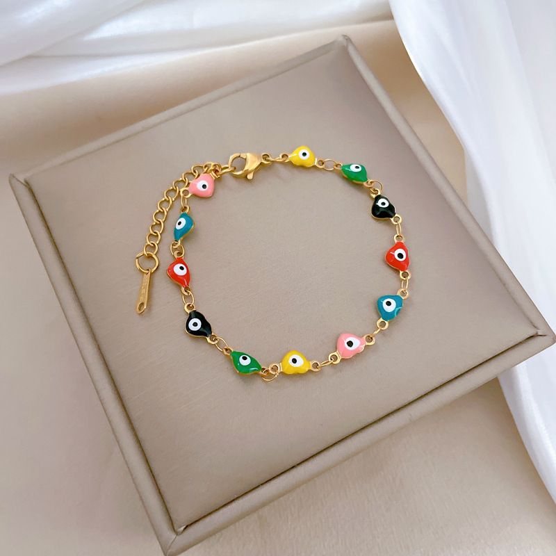 Pulsera minimalista de acero de titanio con ojo de color, estilo retro femenino