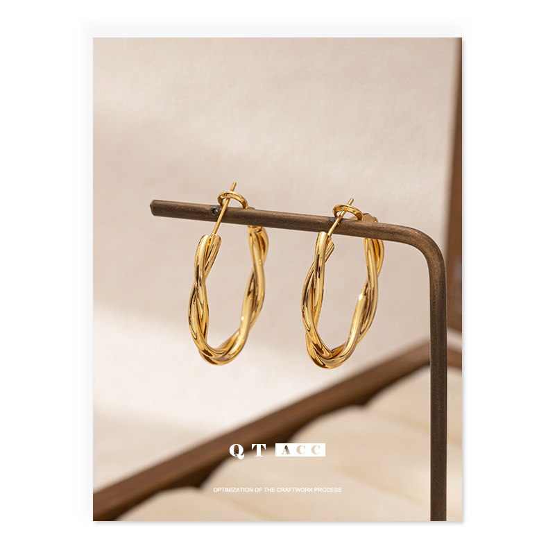 Moda europea y americana de moda fresca, perfiles de alta calidad, líneas laminadas de círculo, personalidad delicada y simple, pendientes de estilo de temperamento para mujeres
