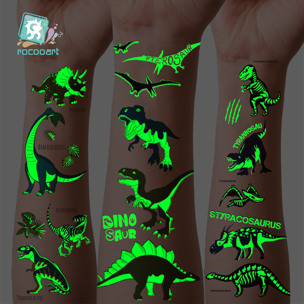 Suministro transfronterizo nuevo dinosaurio luminoso tatuaje pegatinas niños dibujos animados diversión pegatinas luminosas pegatinas temporales del tatuaje