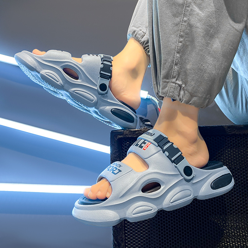 Zapatillas de un solo carácter para hombre 2025 uso exterior de verano suela gruesa pisando mierda, deportes de playa, sandalias de doble uso para conducción, mujeres transfronterizas