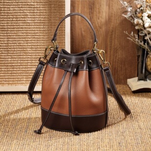 O 69394 Retro color-block bucket bag �͹�ײɫˮͰ���羳