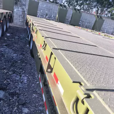 Cross-Border Export of Low-Platform Semi-Trailers Ağır yük qoşquları