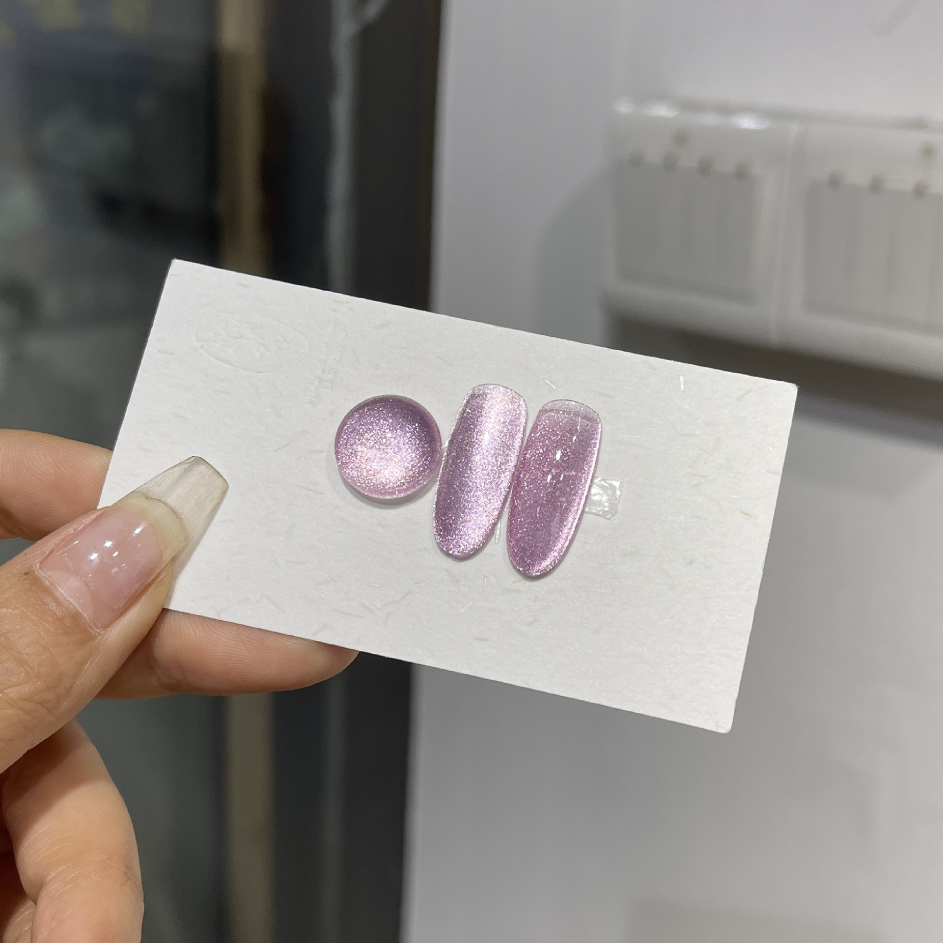 Venta caliente transfronteriza pegamento para ojos de gato rojo hielo arte de uñas celebridades de Internet caliente tienda de uñas de uso común pegamento de esmalte de uñas de ojo de gato de cristal popular
