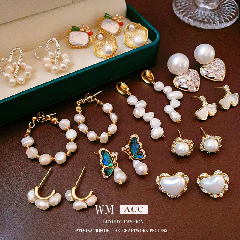 Aguja de plata pendientes de perlas de agua dulce verdadero oro galvanoplastia moda todo partido nicho de lujo de alta calidad pendientes de fábrica al por mayor