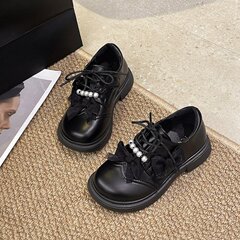 女の子の靴2025春の新しい子供の王女の靴春秋の女性の宝の靴の黒色の洋気の福の靴の柔らかい底