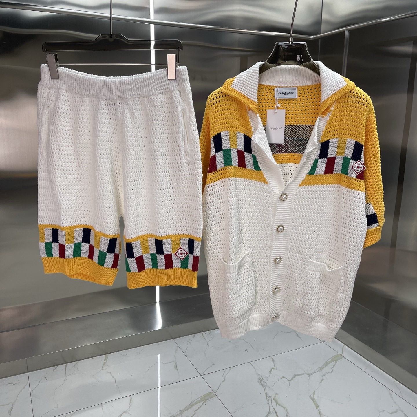 Comercio exterior casa Casablanca suéter suéter de manga corta jacquard cardigan polo pareja pantalones cortos traje