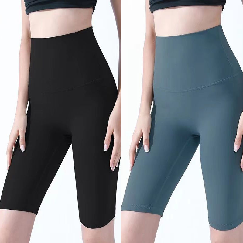 Pantalones cortos desnudos de mujer elásticos apretados para elevar las caderas de cinco puntos pantalones deportivos de secado rápido succión de sudor entrenamiento para correr fábrica de comercio de ping