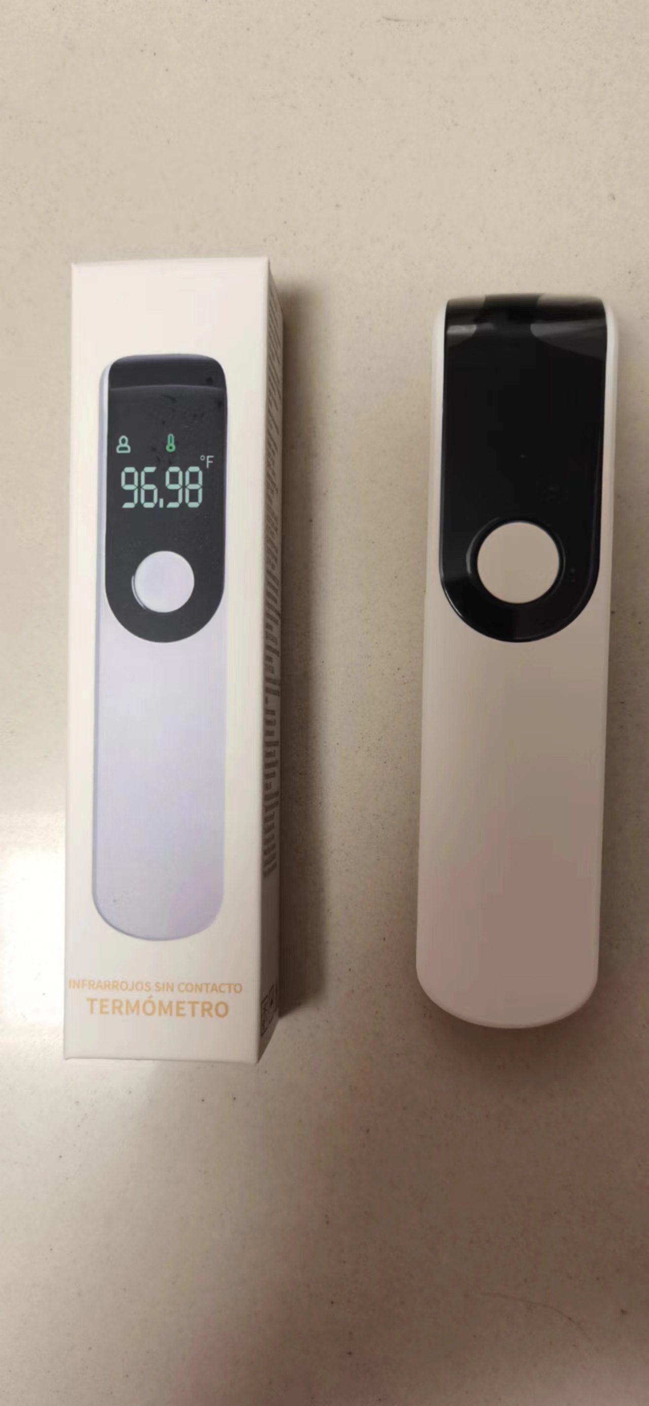 Termómetro de frente mini original de fábrica, termómetro electrónico infrarrojo sin contacto de mano, termómetro para bebés en chino/inglés/japonés