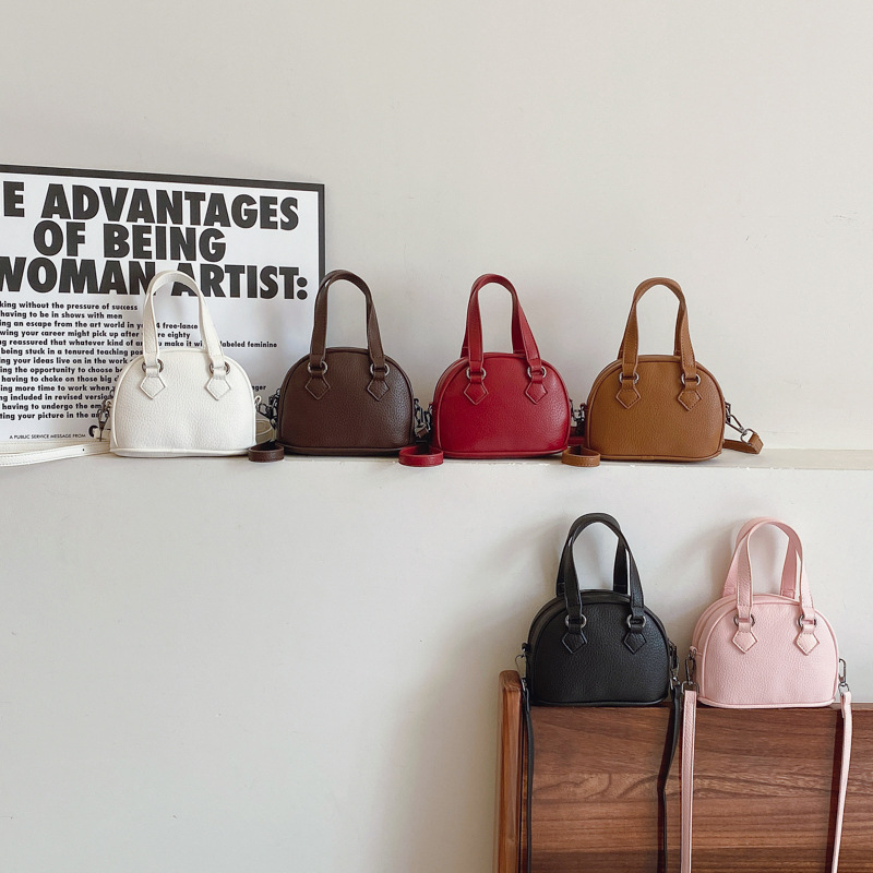 Bolsas infantiles de comercio exterior transfronterizo niñas padres e hijos mini bolsas portátiles 2026 nuevas bolsas de hombro para hombres y mujeres
