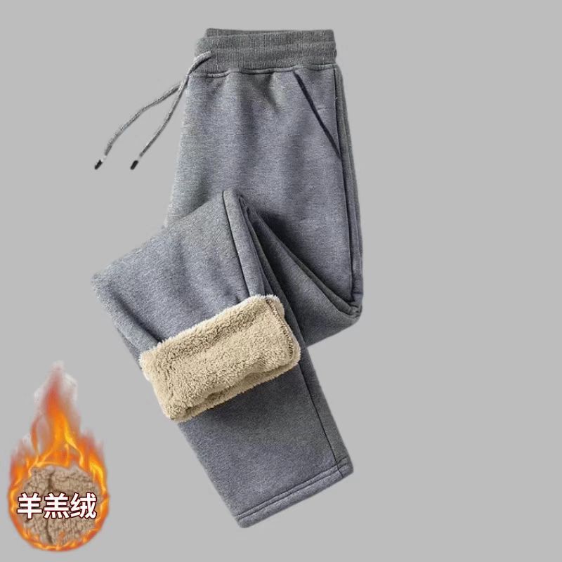 En stock pantalones de invierno de los hombres forrados de lana engrosada pantalones casuales estilo coreano de moda recta suelta más el tamaño de todos los deportes a juego hombres