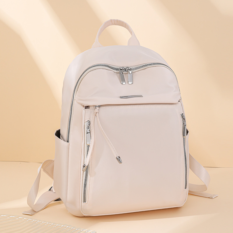 Mochila de sentido avanzado para mujer 2024 nueva mochila de computadora ligera de viaje de moda simple y versátil para estudiantes universitarios