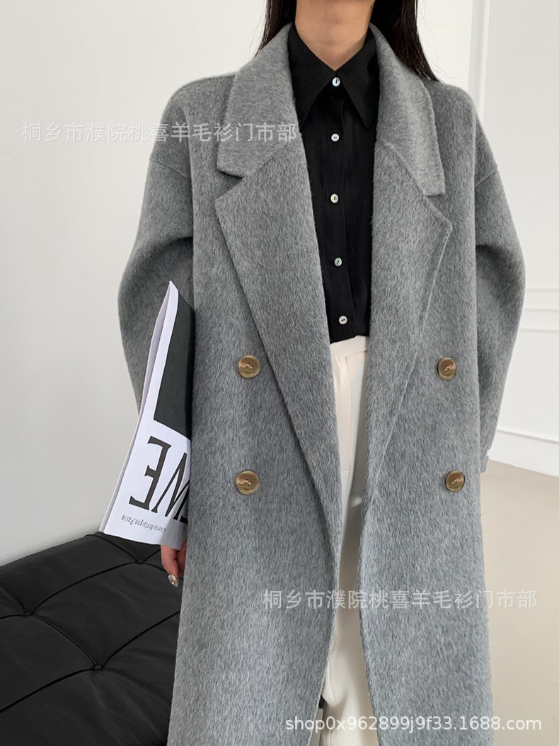 背の高い【韓系の怠惰でシンプルな繭型】ハイエンドの韓国版の通勤両面のウールの女性の長いタイプの毛のコートです。