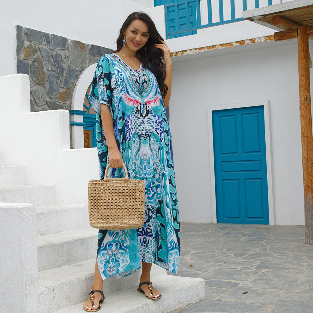 Blusa de playa de cuatro lados elástico impreso playa protección solar camisa traje falda de vacaciones bikini blusa europea y americana 5D35