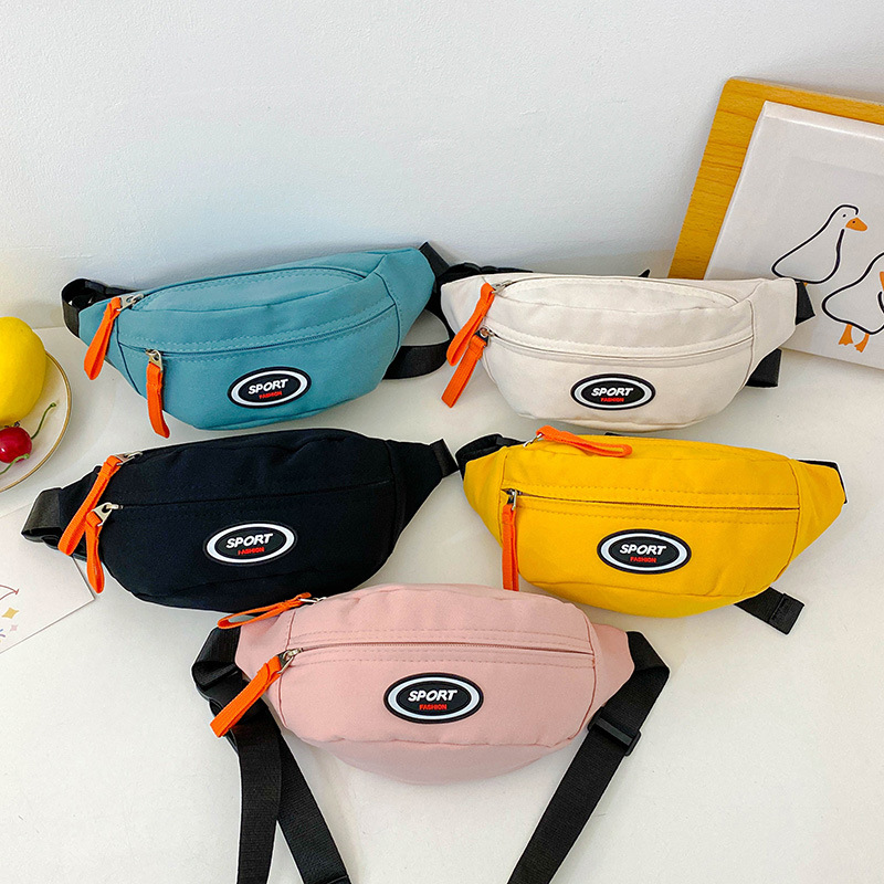 Bolso de pecho coreano para niños y niñas letras extranjeras de viaje ligero bebé mochila 2025 nuevo bolso de cambio para niños