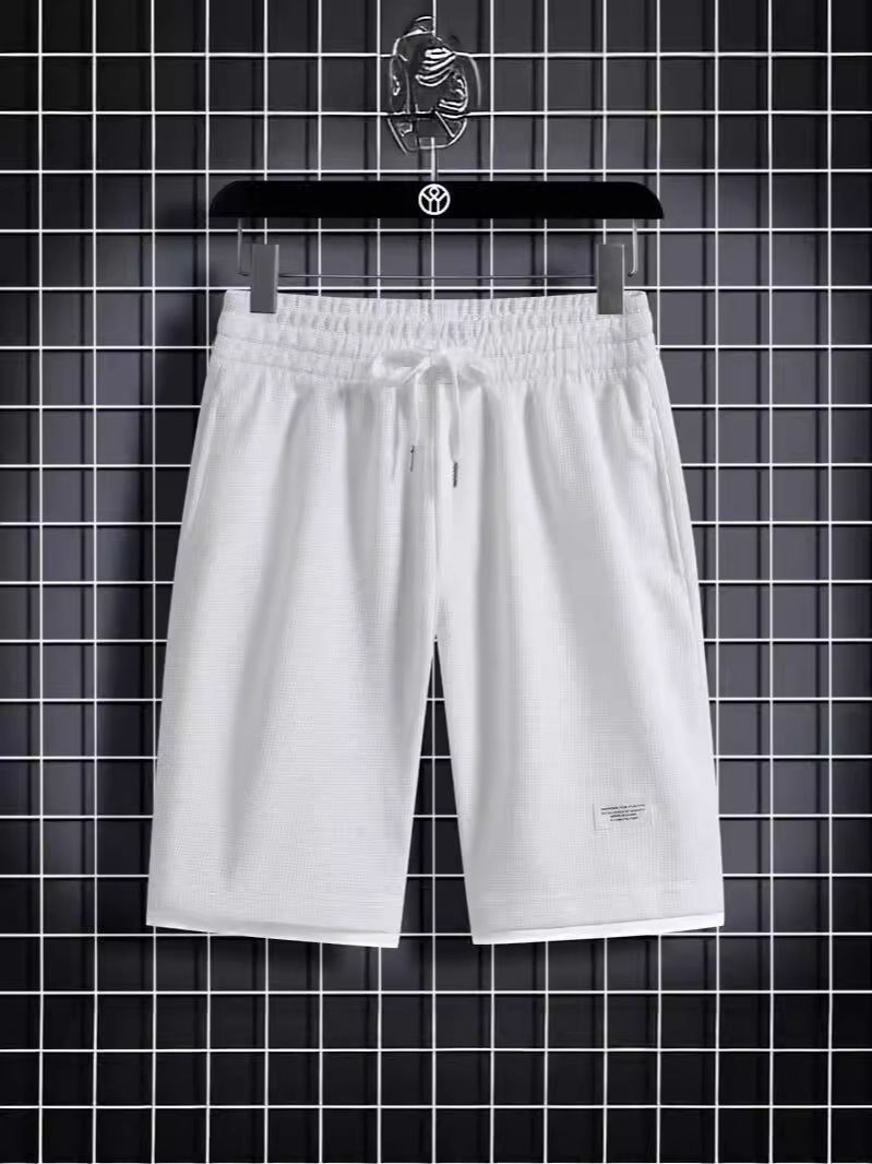 Camisa menos ropa Waffle pantalones de cinco puntos para hombres verano nuevo estilo estilo Hong Kong pantalones cortos de dos piezas falsos de color recto suelto