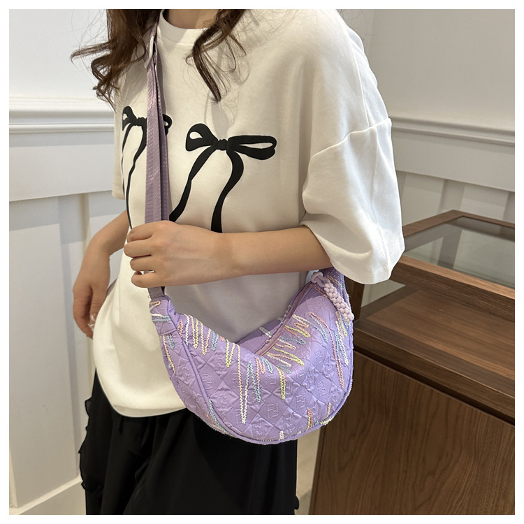 The new 2024 fashionable canvas versatile dumpling bag, a simple and stylish single-shoulder bag for commuting ladies with a high level of appearance undefined